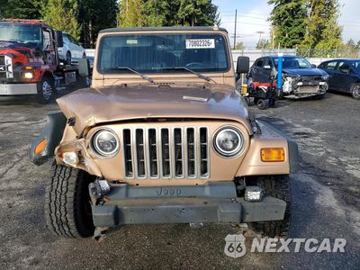 Piąte zdjęcie samochodu w środku: 2000 JEEP WRANGLER / TJ SPORT VIN:1J4FA49S1YP713263 - miniatura