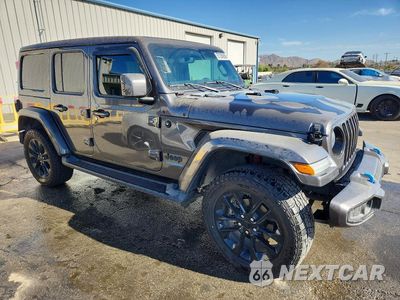Czwarte zdjęcie samochodu z boku: 2021 JEEP WRANGLER UNLIMITED SAHARA 4XE VIN:1C4JJXP66MW716926 - miniatura