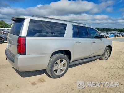 Trzecie zdjęcie samochodu z tyłu: 2018 CHEVROLET SUBURBAN C1500 LT VIN:1GNSCHKC0JR270601 - miniatura
