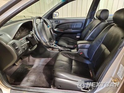 Zdjęcie 7 z 12 samochodu: 1997 NISSAN MAXIMA GXE VIN:JN1CA21D3VT210916 - miniatura