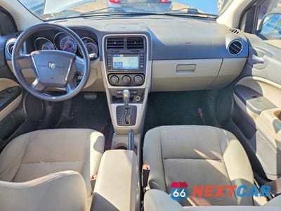 Zdjęcie 8 z 13 samochodu: 2010 DODGE CALIBER MAINSTREET VIN:1B3CB3HAXAD573943 - miniatura