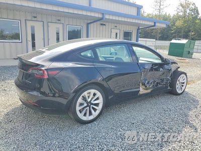 Trzecie zdjęcie samochodu z tyłu: 2022 TESLA MODEL 3 VIN:5YJ3E1EB7NF115279 - miniatura