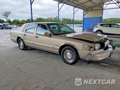Czwarte zdjęcie samochodu z boku: 1997 LINCOLN TOWN CAR SIGNATURE VIN:1LNLM82WXVY749877 - miniatura