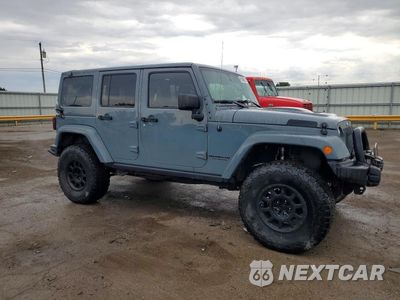 Czwarte zdjęcie samochodu z boku: 2015 JEEP WRANGLER UNLIMITED RUBICON VIN:1C4BJWFG3FL715956 - miniatura