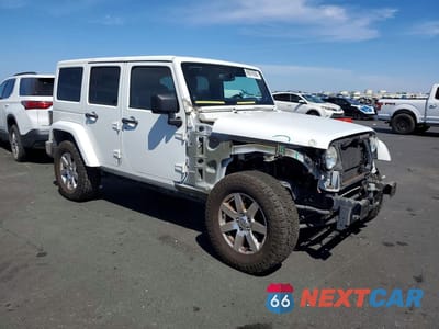 Czwarte zdjęcie samochodu z boku: 2013 JEEP WRANGLER UNLIMITED SAHARA VIN:1C4BJWEG0DL647257 - miniatura