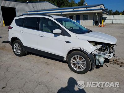 Czwarte zdjęcie samochodu z boku: 2017 FORD ESCAPE SE VIN:1FMCU0G90HUE51273 - miniatura