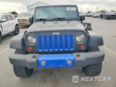Piąte zdjęcie samochodu w środku: 2012 JEEP WRANGLER UNLIMITED SAHARA VIN:1C4BJWEG3CL241276 - miniatura