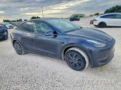 Czwarte zdjęcie samochodu z boku: 2025 TESLA MODEL Y VIN:7SAYGDED5SA338712 - miniatura