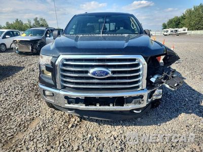 Piąte zdjęcie samochodu w środku: 2015 FORD F150 SUPERCREW VIN:1FTFW1EF6FFB43701 - miniatura