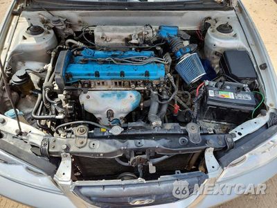 Zdjęcie 11 z 12 samochodu: 2005 HYUNDAI ELANTRA GLS VIN:KMHDN46D15U043326 - miniatura