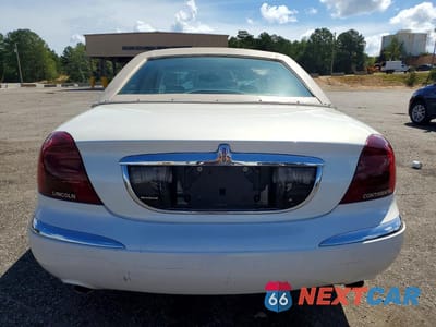 Zdjęcie 6 z 12 samochodu: 2000 LINCOLN CONTINENTAL VIN:1LNHM97V0YY798389 - miniatura