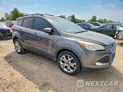 Czwarte zdjęcie samochodu z boku: 2014 FORD ESCAPE SE VIN:1FMCU0GX4EUB56090 - miniatura