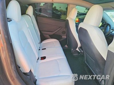 Zdjęcie 10 z 13 samochodu: 2023 TESLA MODEL Y VIN:7SAYGDEE6PF871283 - miniatura