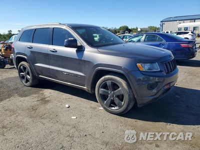 Czwarte zdjęcie samochodu z boku: 2015 JEEP GRAND CHEROKEE LAREDO VIN:1C4RJFAG8FC644243 - miniatura