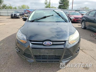 Piąte zdjęcie samochodu w środku: 2014 FORD FOCUS TITANIUM VIN:1FADP3N24EL271549 - miniatura