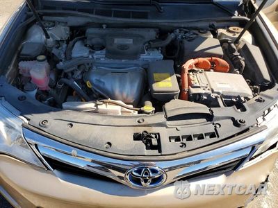 Zdjęcie 11 z 12 samochodu: 2012 TOYOTA CAMRY HYBRID XLE VIN:4T1BD1FK6CU030172 - miniatura