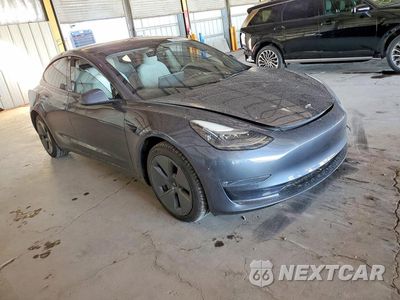 Czwarte zdjęcie samochodu z boku: 2022 TESLA MODEL 3 VIN:5YJ3E1EB8NF136321 - miniatura