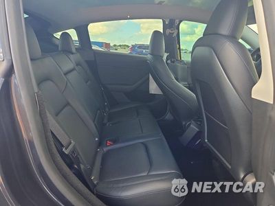 Zdjęcie 10 z 12 samochodu: 2025 TESLA MODEL Y VIN:7SAYGDEF7SA372068 - miniatura
