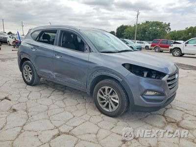 Czwarte zdjęcie samochodu z boku: 2017 HYUNDAI TUCSON SE VIN:KM8J33A44HU294291 - miniatura