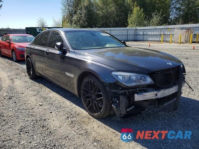 Czwarte zdjęcie samochodu z boku: 2014 BMW 750 XI VIN:WBAYB6C58ED224217 - miniatura