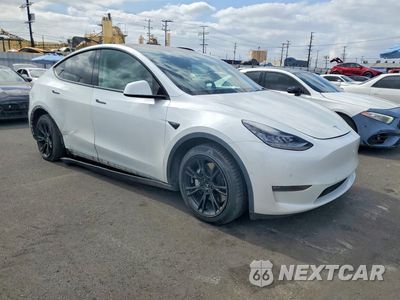 Czwarte zdjęcie samochodu z boku: 2021 TESLA MODEL Y VIN:5YJYGDEE8MF077829 - miniatura