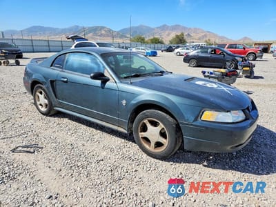 Czwarte zdjęcie samochodu z boku: 1999 FORD MUSTANG GT VIN:1FAFP42X9XF129343 - miniatura