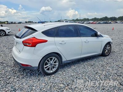 Trzecie zdjęcie samochodu z tyłu: 2016 FORD FOCUS SE VIN:1FADP3K28GL283646 - miniatura