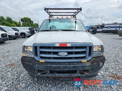 Piąte zdjęcie samochodu w środku: 2003 FORD F350 SUPER DUTY VIN:1FTWF32SX3ED84823 - miniatura