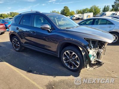 Czwarte zdjęcie samochodu z boku: 2016 MAZDA CX-5 GT VIN:JM3KE4DY7G0675198 - miniatura
