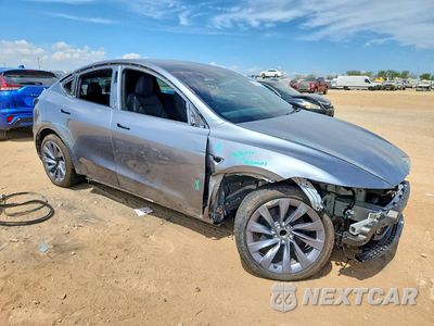 Czwarte zdjęcie samochodu z boku: 2026 TESLA MODEL Y VIN:7SAYGDED8TA740001 - miniatura