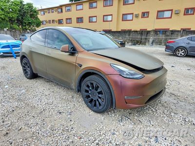 Czwarte zdjęcie samochodu z boku: 2023 TESLA MODEL Y VIN:7SAYGDEE1PF885169 - miniatura