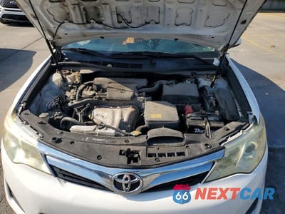Zdjęcie 12 z 13 samochodu: 2014 TOYOTA CAMRY LE VIN:4T1BF1FK1EU870034 - miniatura