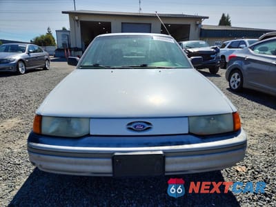 Piąte zdjęcie samochodu w środku: 1991 FORD ESCORT LX VIN:1FAPP14J1MW284363 - miniatura