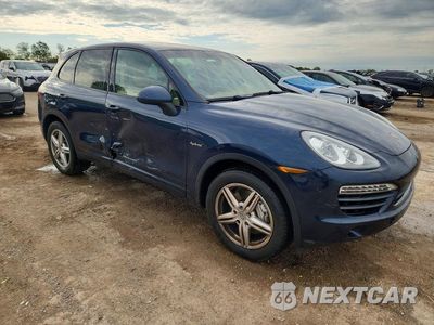Czwarte zdjęcie samochodu z boku: 2012 PORSCHE CAYENNE S HYBRID VIN:WP1AE2A26CLA92458 - miniatura
