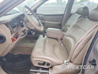 Zdjęcie 7 z 12 samochodu: 1997 BUICK PARK AVENUE ULTRA VIN:1G4CU521XV4658313 - miniatura