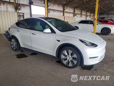 Czwarte zdjęcie samochodu z boku: 2021 TESLA MODEL Y VIN:5YJYGDEEXMF098648 - miniatura