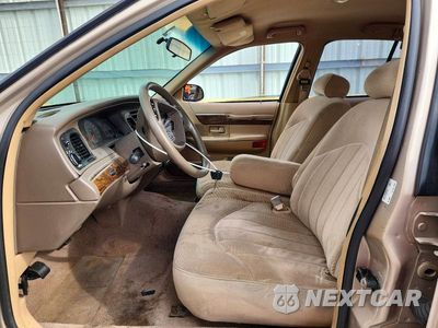 Zdjęcie 7 z 12 samochodu: 1998 MERCURY GRAND MARQUIS GS VIN:2MEFM74W9WX662447 - miniatura