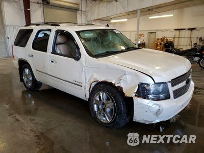 Czwarte zdjęcie samochodu z boku: 2010 CHEVROLET TAHOE K1500 LTZ VIN:1GNUKCE08AR278381 - miniatura