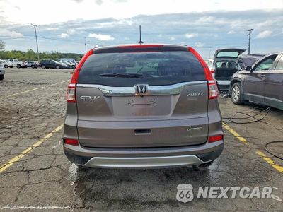 Zdjęcie 6 z 13 samochodu: 2016 HONDA CR-V TOURING VIN:5J6RM4H9XGL006249 - miniatura