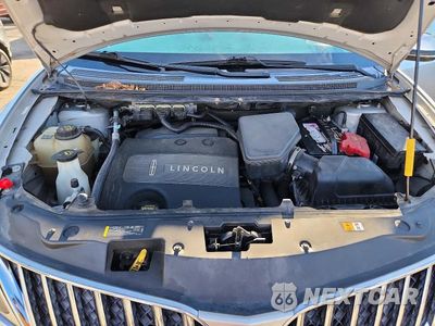 Zdjęcie 12 z 13 samochodu: 2013 LINCOLN MKX VIN:2LMDJ8JK3DBL23802 - miniatura
