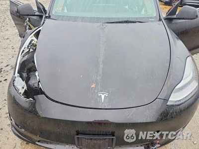Zdjęcie 11 z 12 samochodu: 2023 TESLA MODEL Y VIN:7SAYGDEE0PA114571 - miniatura