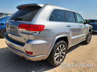 Trzecie zdjęcie samochodu z tyłu: 2017 JEEP GRAND CHEROKEE OVERLAND VIN:1C4RJECG9HC605722 - miniatura