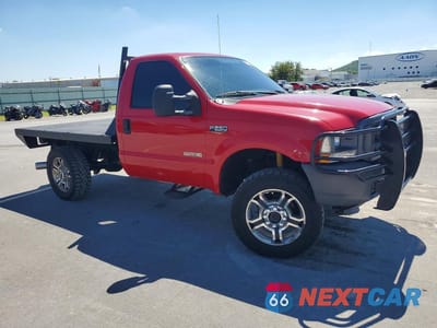Czwarte zdjęcie samochodu z boku: 2004 FORD F250 SUPER DUTY VIN:1FTNF21P34EB34179 - miniatura