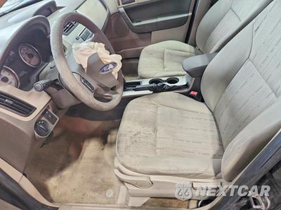 Zdjęcie 7 z 12 samochodu: 2010 FORD FOCUS SE VIN:1FAHP3FN7AW251704 - miniatura