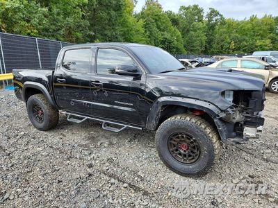 Czwarte zdjęcie samochodu z boku: 2023 TOYOTA TACOMA TRD PRO VIN:3TYCZ5AN6PT166299 - miniatura