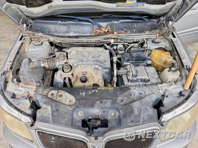 Zdjęcie 12 z 13 samochodu: 2006 PONTIAC TORRENT VIN:2CKDL63F066080050 - miniatura