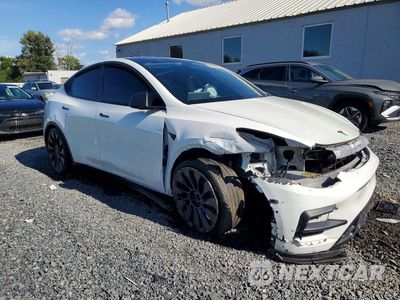 Czwarte zdjęcie samochodu z boku: 2022 TESLA MODEL Y VIN:7SAYGDEF2NF544658 - miniatura