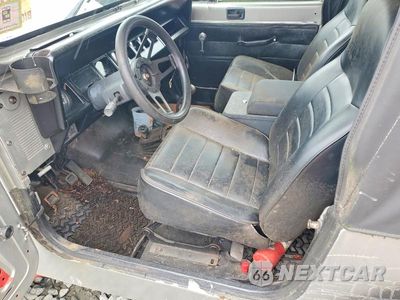 Zdjęcie 7 z 12 samochodu: 1987 JEEP WRANGLER VIN:2BCCV8114HB530360 - miniatura