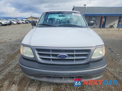 Piąte zdjęcie samochodu w środku: 2002 FORD F150 VIN:1FTRF172X2KC00555 - miniatura