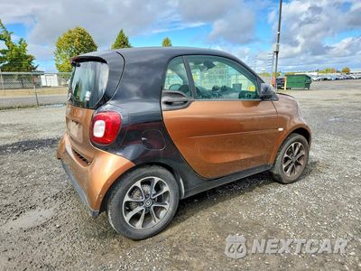 Trzecie zdjęcie samochodu z tyłu: 2016 SMART FORTWO VIN:WMEFJ5DA2GK060532 - miniatura